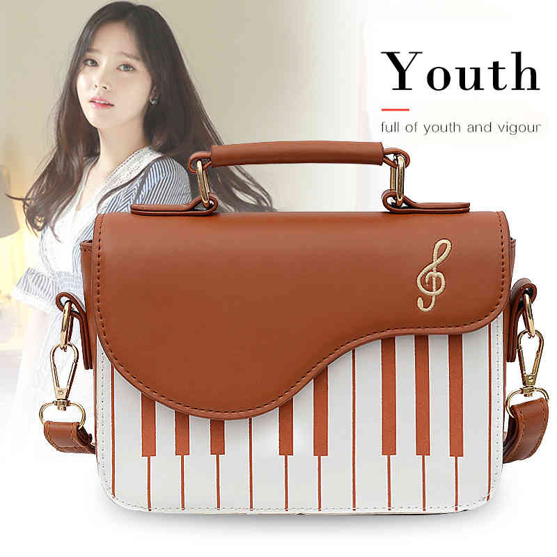 Mini designer piano girl crossbody organizer shoulder bag for travel(图1)