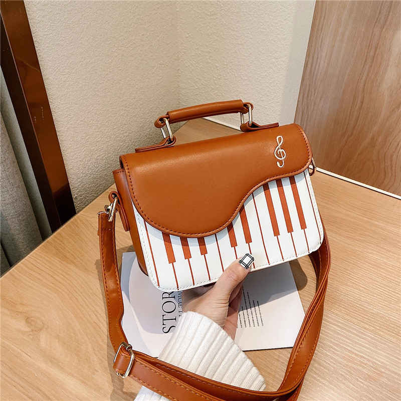 Mini designer piano girl crossbody organizer shoulder bag for travel(图27)